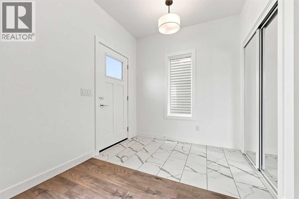 268 Huxbury View NE, Calgary, Alberta  T2A 8C4 - Photo 3 - A2330612