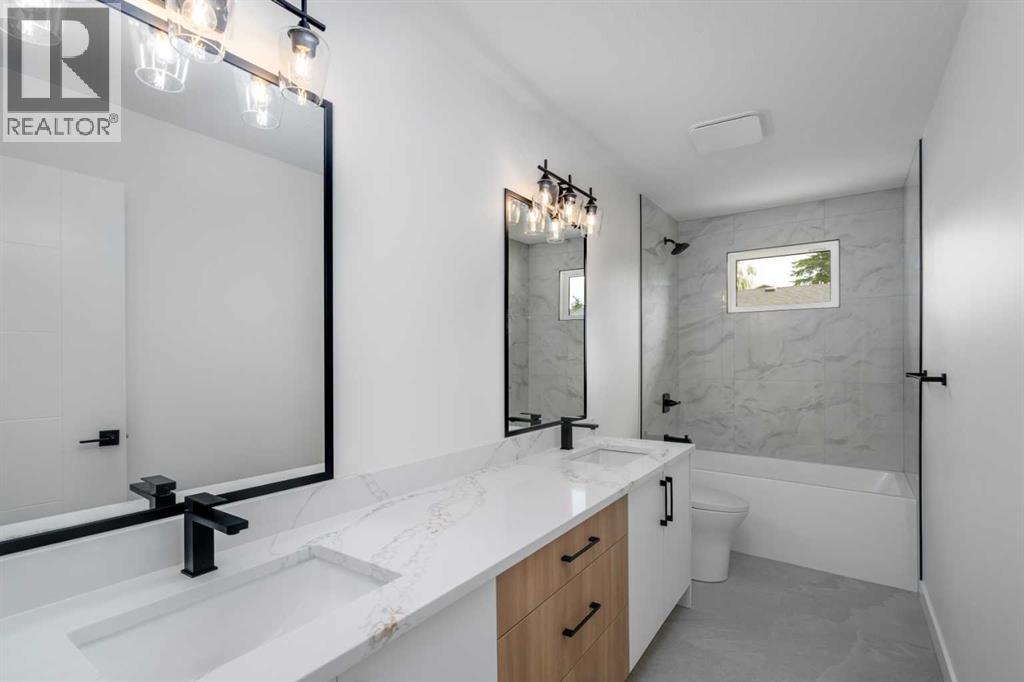 312 Queensland Road Se, Calgary, Alberta  T2J 3S6 - Photo 11 - A2316310