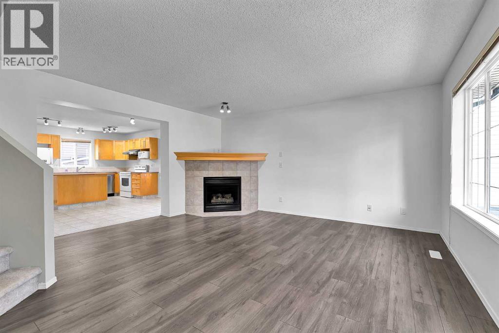 203 Covemeadow Crescent, Calgary, Alberta  T3K 6B1 - Photo 6 - A2325400