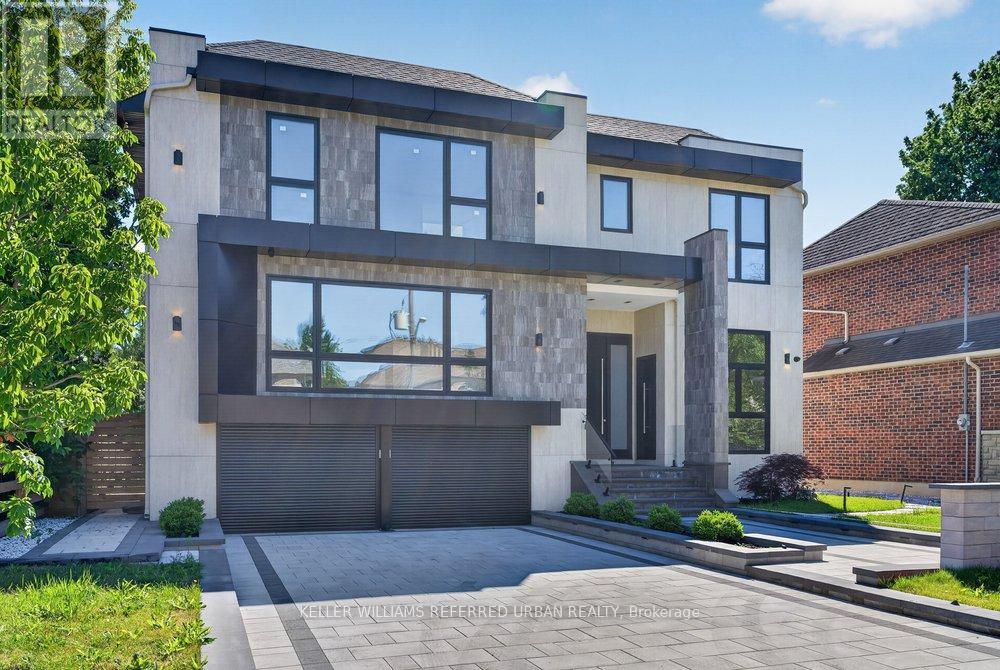 <div class="slider-price">$4,198,000</div><p>103 Bevdale Road, Toronto, Ontario</p>