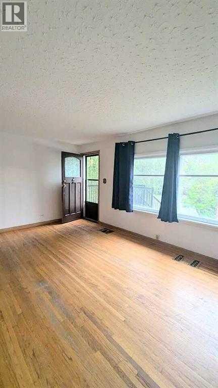 1436 22 Avenue NW, Calgary, Alberta  T2M 1P8 - Photo 5 - A2336468