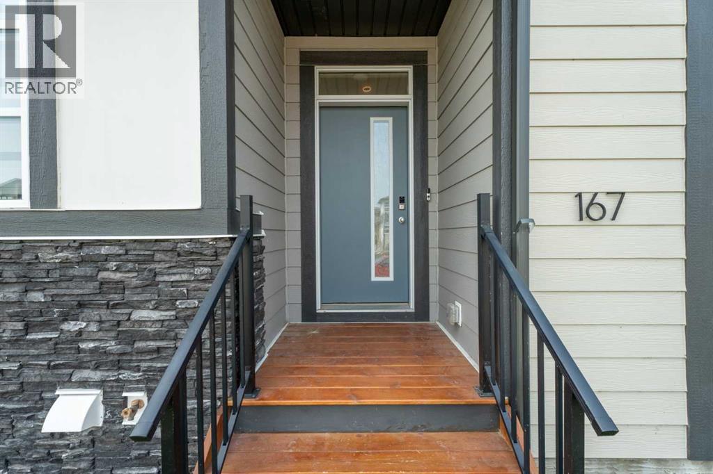 167 Wolf Creek Avenue SE, Calgary, Alberta  T2X 4V1 - Photo 2 - A2331157