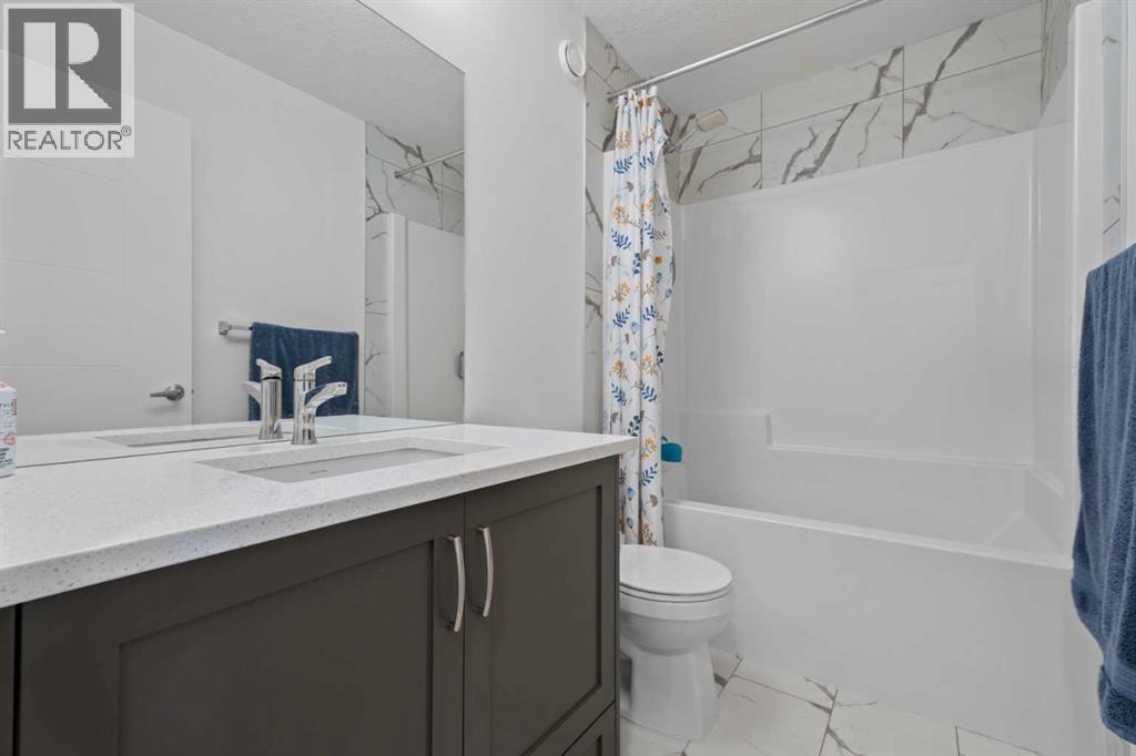 167 Wolf Creek Avenue SE, Calgary, Alberta  T2X 4V1 - Photo 28 - A2331157