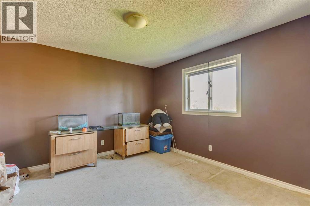 56 Crystal Shores Place, Okotoks, Alberta  T1S 2G3 - Photo 12 - A2306869