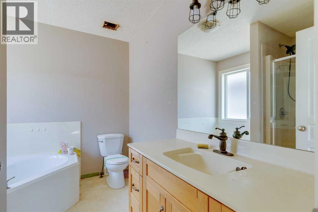 56 Crystal Shores Place, Okotoks, Alberta  T1S 2G3 - Photo 13 - A2306869