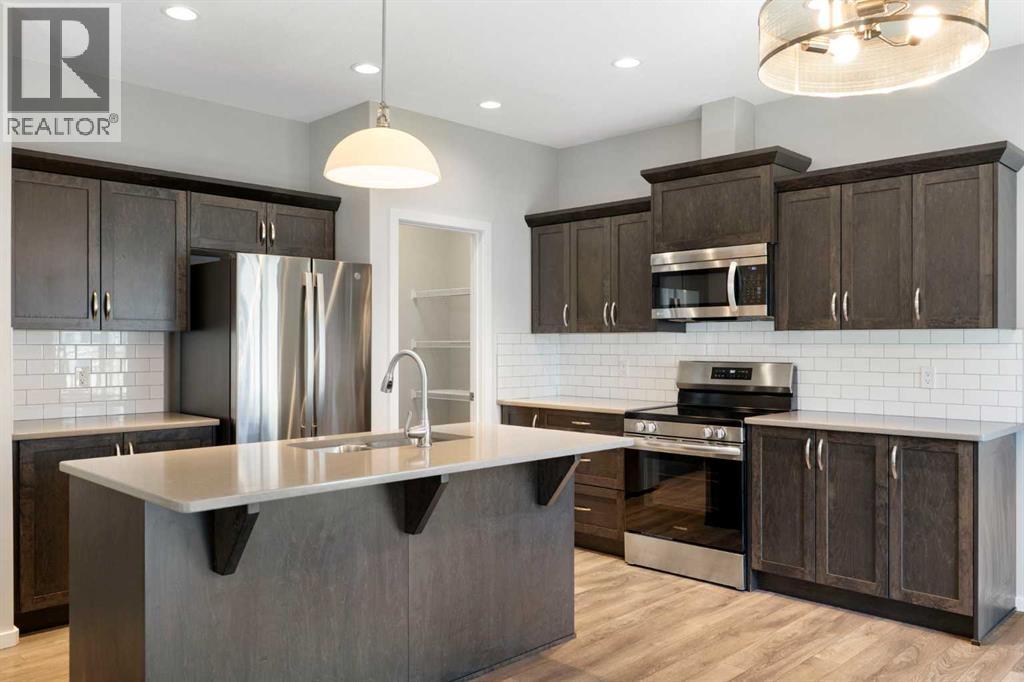 143 Cooperswood Place SW, Airdrie, Alberta  T4B 3Y7 - Photo 6 - A2334651