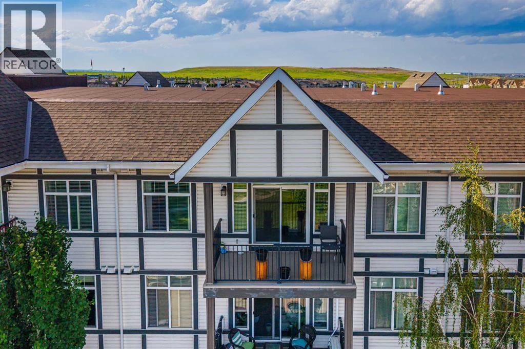 402, 6603 New Brighton Avenue SE, Calgary, Alberta  T2Z 5E5 - Photo 1 - A2328909