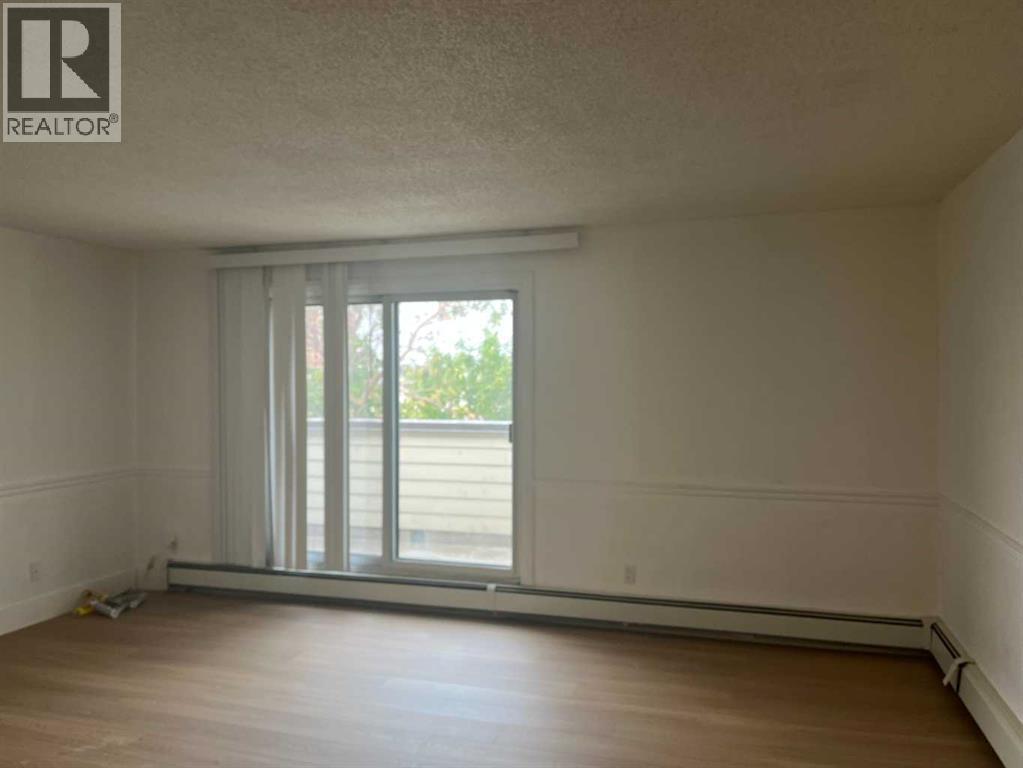 404, 1113 37 Street SW, Calgary, Alberta  T3C 1S5 - Photo 4 - A2334218
