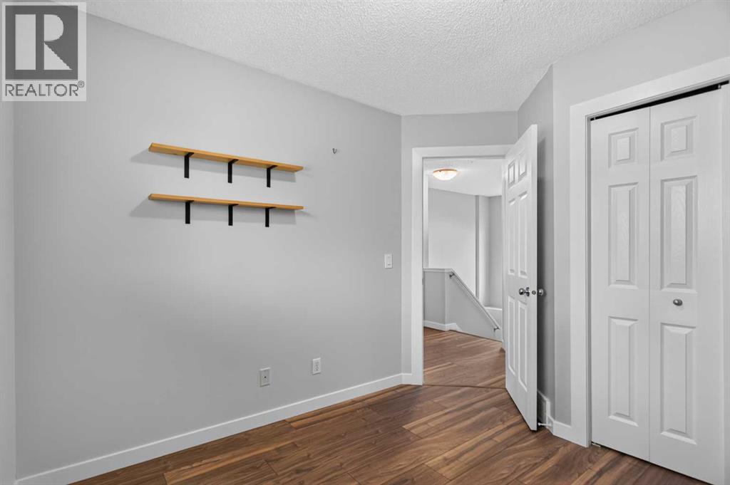 56 Silver Creek Boulevard, Airdrie, Alberta  T4B 2P6 - Photo 18 - A2336470