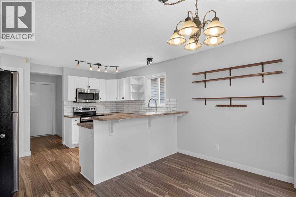 56 Silver Creek Boulevard, Airdrie, Alberta  T4B 2P6 - Photo 13 - A2336470