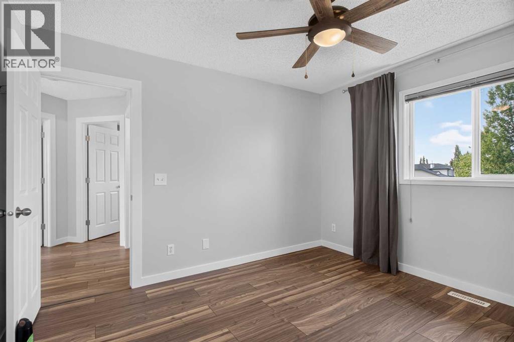 56 Silver Creek Boulevard, Airdrie, Alberta  T4B 2P6 - Photo 19 - A2336470