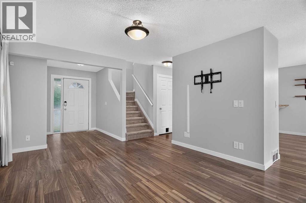 56 Silver Creek Boulevard, Airdrie, Alberta  T4B 2P6 - Photo 6 - A2336470
