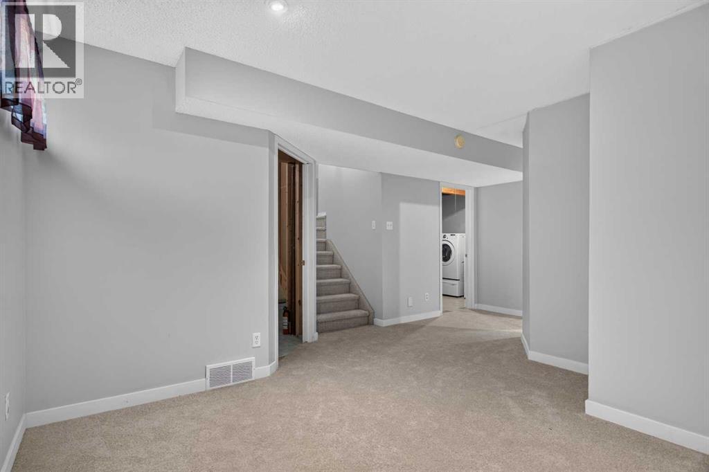 56 Silver Creek Boulevard, Airdrie, Alberta  T4B 2P6 - Photo 26 - A2336470