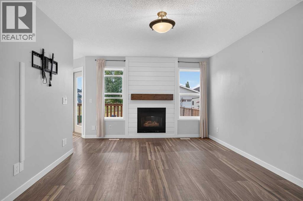 56 Silver Creek Boulevard, Airdrie, Alberta  T4B 2P6 - Photo 5 - A2336470