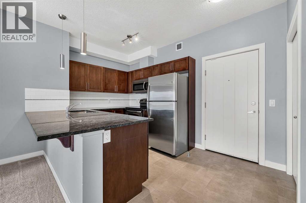 2405, 604 East Lake Boulevard NE, Airdrie, Alberta  T4A 0G6 - Photo 3 - A2336138
