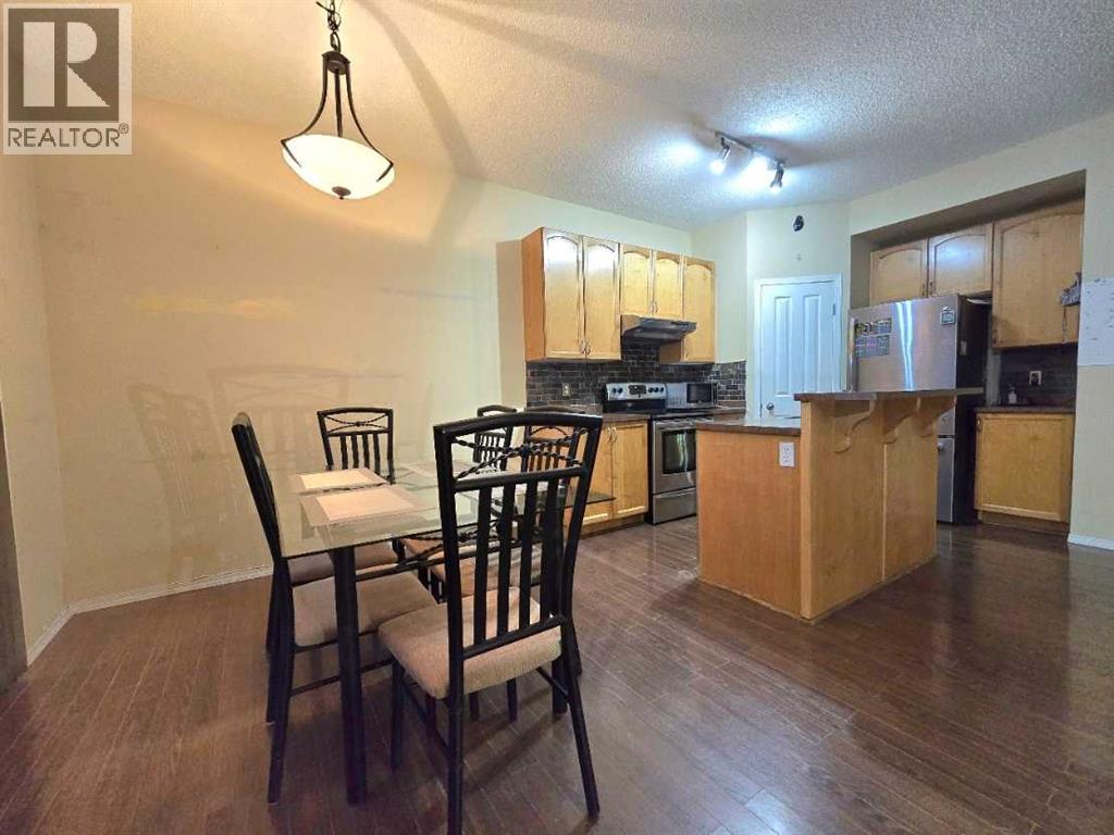 13 Tuscany Ridge Mews NW, Calgary, Alberta  T3L 3B7 - Photo 7 - A2321327