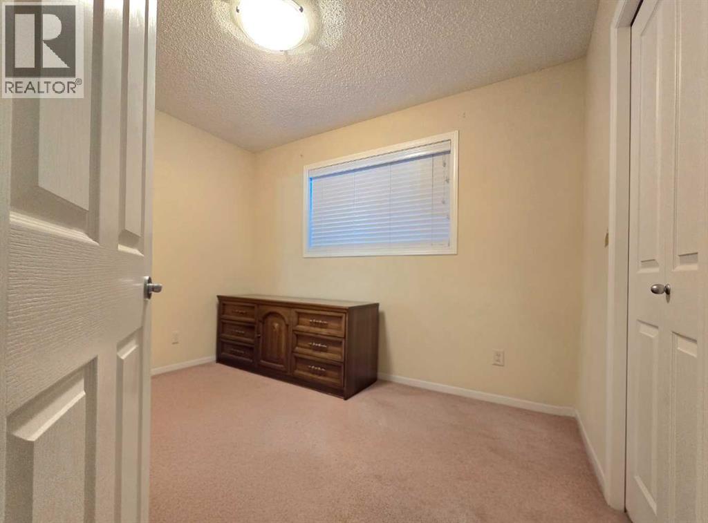 13 Tuscany Ridge Mews NW, Calgary, Alberta  T3L 3B7 - Photo 15 - A2321327
