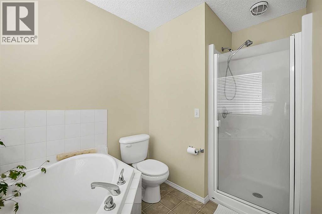 13 Tuscany Ridge Mews NW, Calgary, Alberta  T3L 3B7 - Photo 13 - A2321327