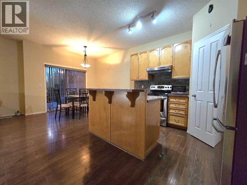 13 Tuscany Ridge Mews NW, Calgary, Alberta  T3L 3B7 - Photo 4 - A2321327