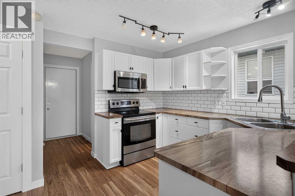 56 Silver Creek Boulevard, Airdrie, Alberta  T4B 2P6 - Photo 12 - A2336470