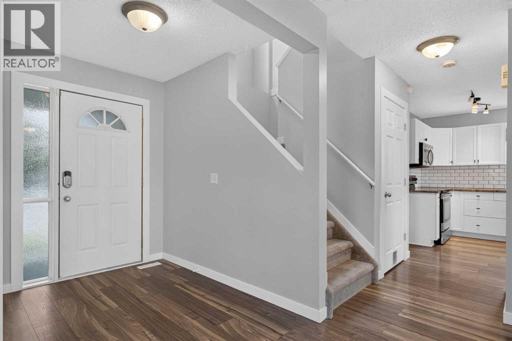 56 Silver Creek Boulevard, Airdrie, Alberta  T4B 2P6 - Photo 7 - A2336470