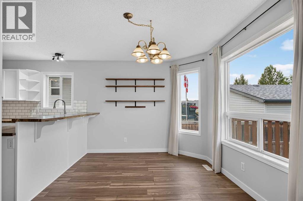 56 Silver Creek Boulevard, Airdrie, Alberta  T4B 2P6 - Photo 8 - A2336470