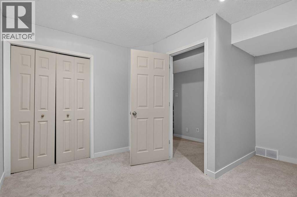 56 Silver Creek Boulevard, Airdrie, Alberta  T4B 2P6 - Photo 25 - A2336470