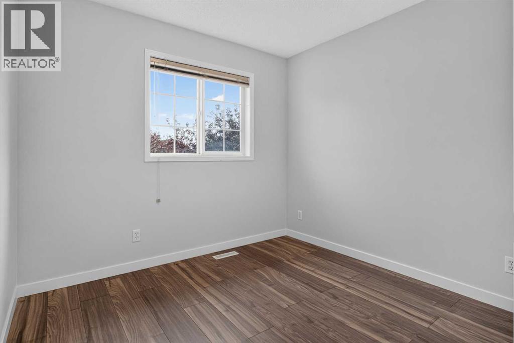 56 Silver Creek Boulevard, Airdrie, Alberta  T4B 2P6 - Photo 21 - A2336470