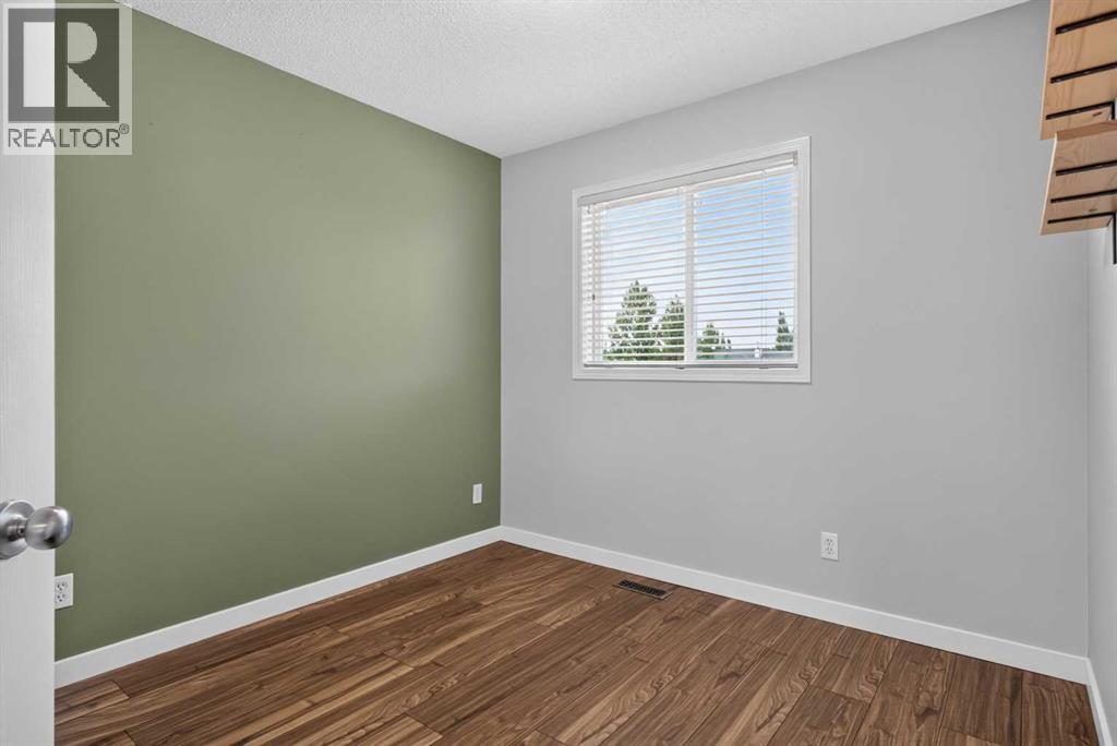 56 Silver Creek Boulevard, Airdrie, Alberta  T4B 2P6 - Photo 22 - A2336470