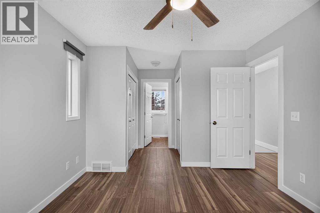 56 Silver Creek Boulevard, Airdrie, Alberta  T4B 2P6 - Photo 16 - A2336470