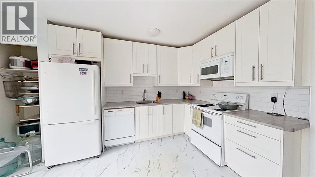 101, 1305 Glenmore Trail, Calgary, Alberta  T2V 4Y8 - Photo 3 - A2318881
