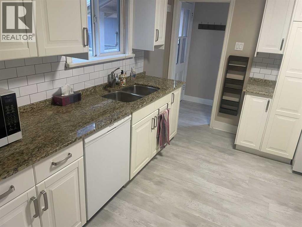 429 10 Street NE, Calgary, Alberta  T2E 4M2 - Photo 12 - A2336249