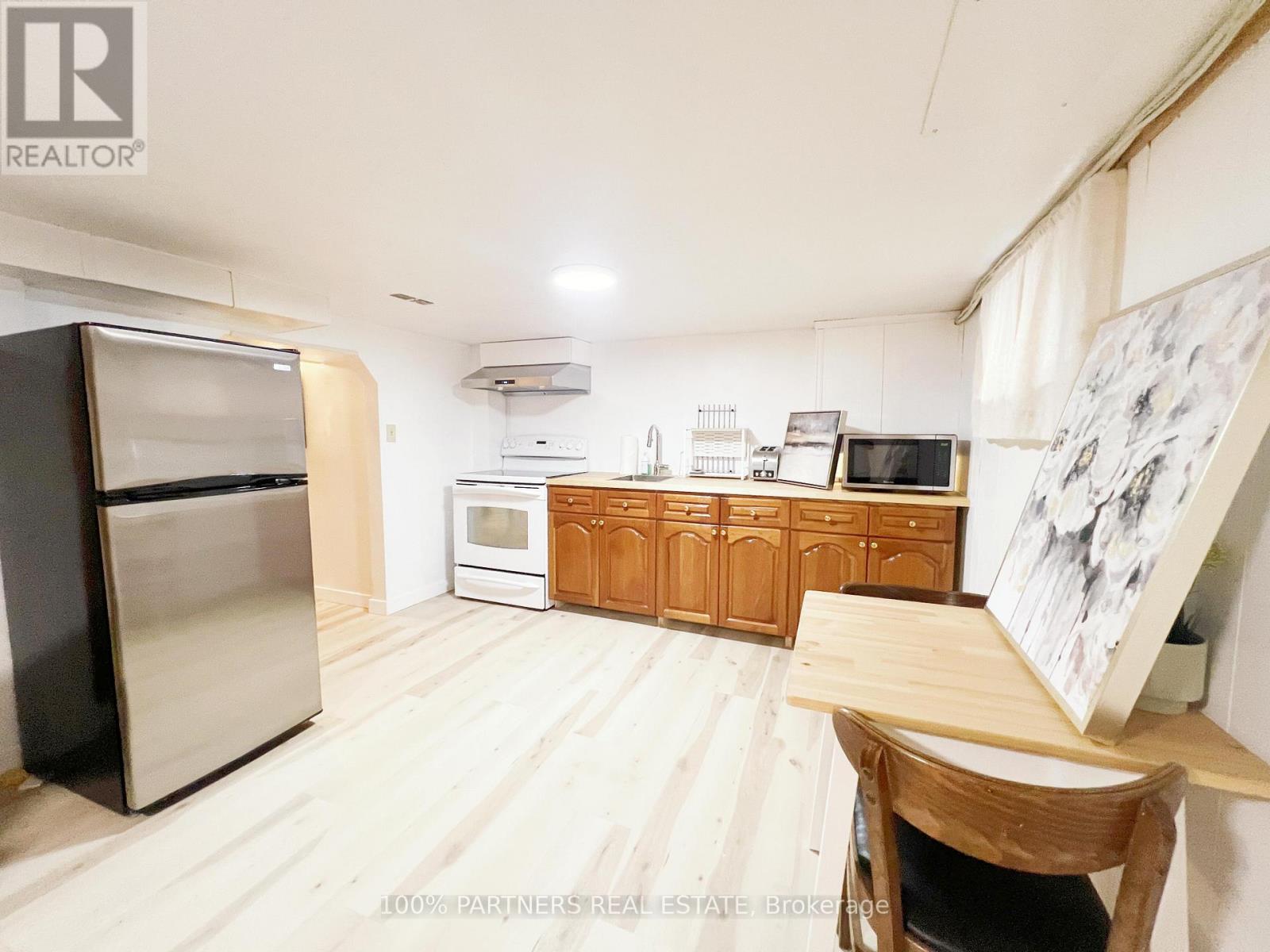 Lower 299 Robina Avenue, Toronto, Ontario  M6C 3Z2 - Photo 4 - C13563528