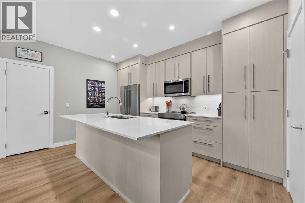 104, 383 Smith Street NW, Calgary, Alberta  T3B 6J9 - Photo 11 - A2325477