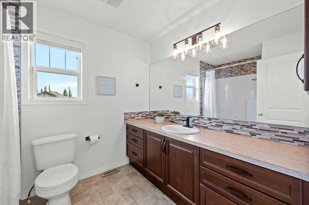 318 Coopers Drive SW, Airdrie, Alberta  T4B 0L8 - Photo 31 - A2318029