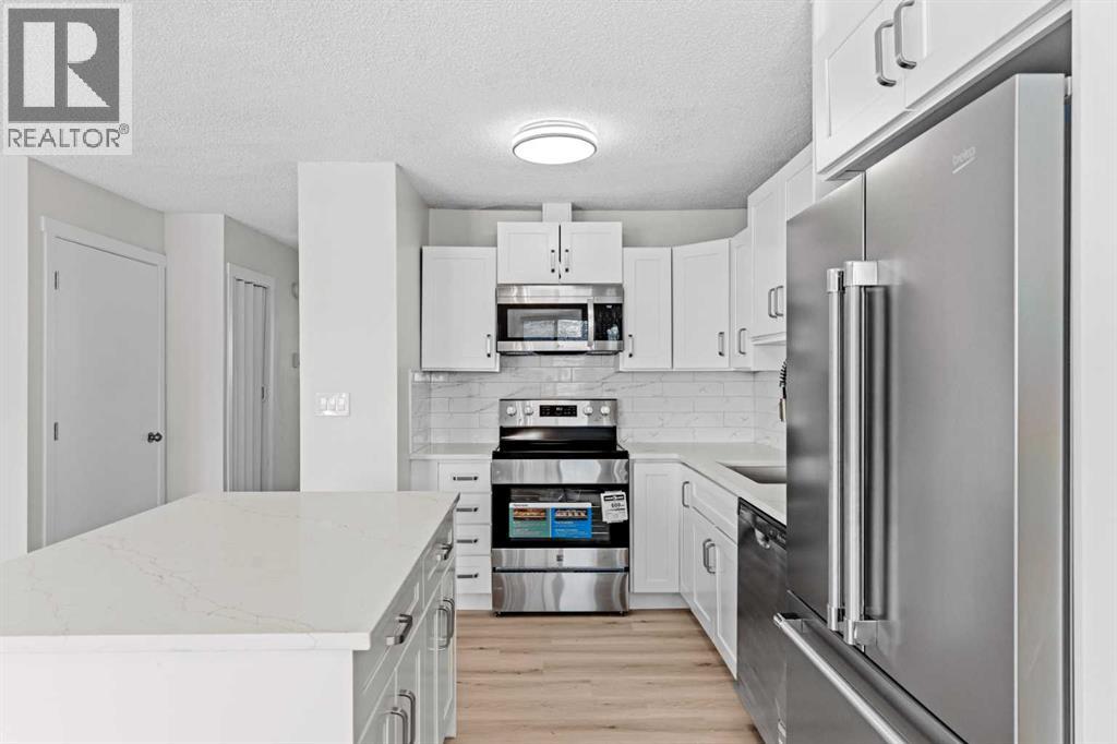 937 Marcombe Drive NE, Calgary, Alberta  T2A 3H2 - Photo 7 - A2323060