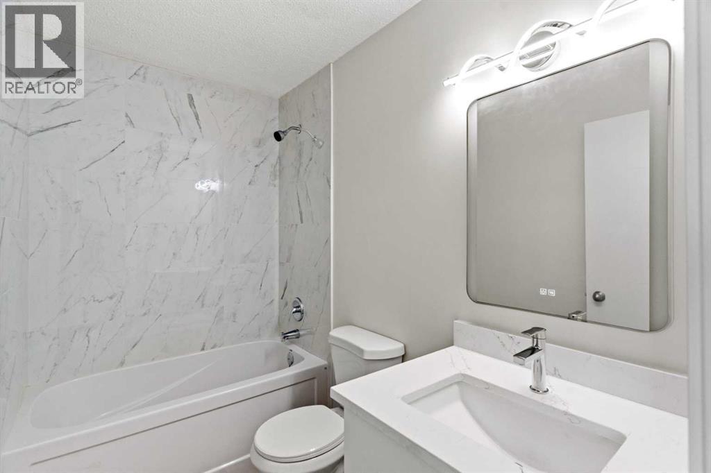 937 Marcombe Drive NE, Calgary, Alberta  T2A 3H2 - Photo 12 - A2323060