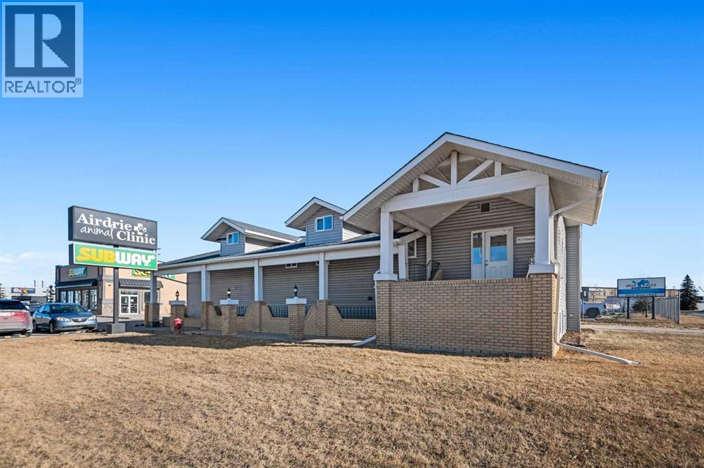 101, 117 East Lake Crescent NE, Airdrie, Alberta  T4A 2H6 - Photo 1 - A2327347