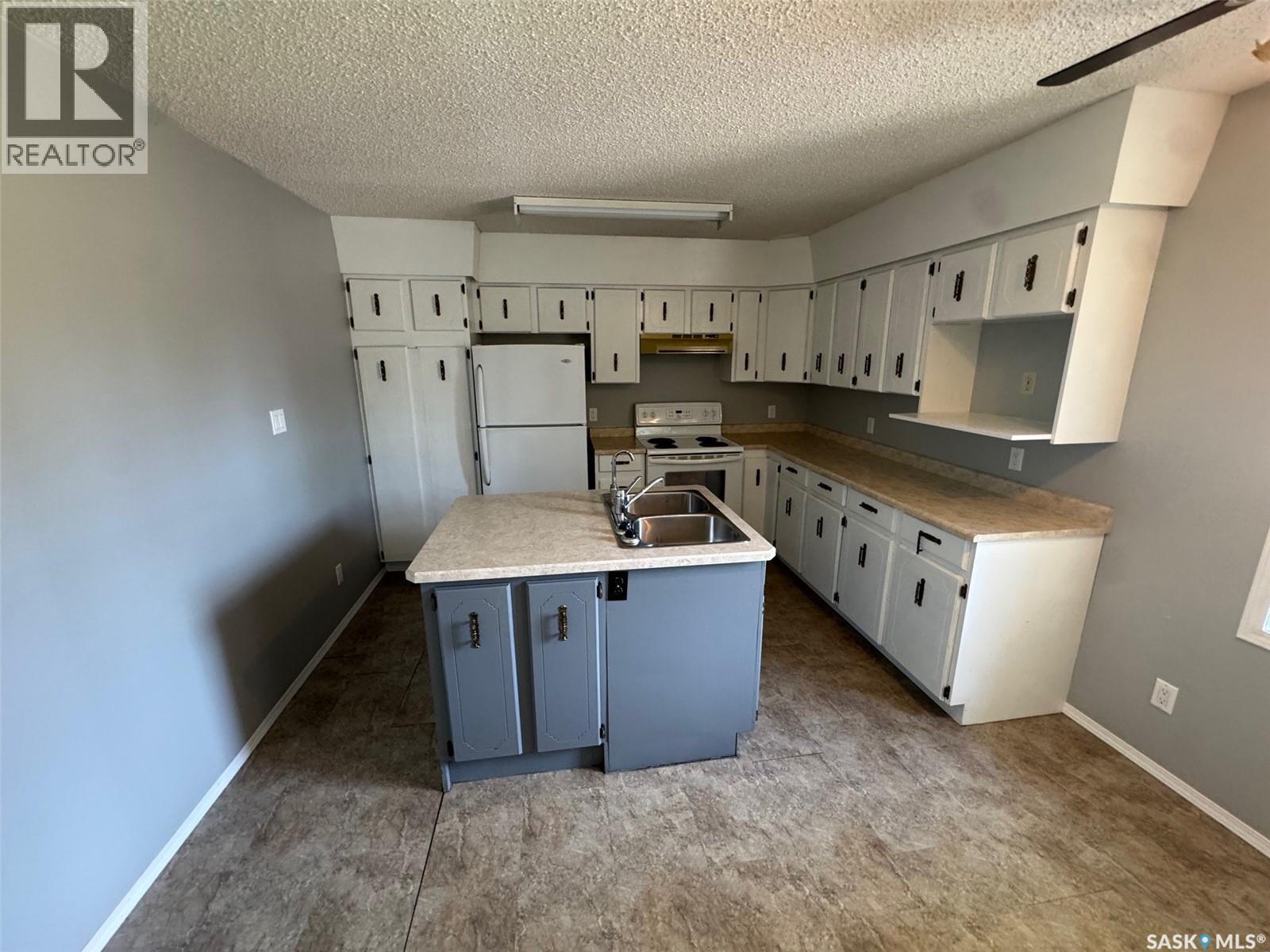 817 97th Avenue, Tisdale, Saskatchewan  S0E 1T0 - Photo 6 - SK045337