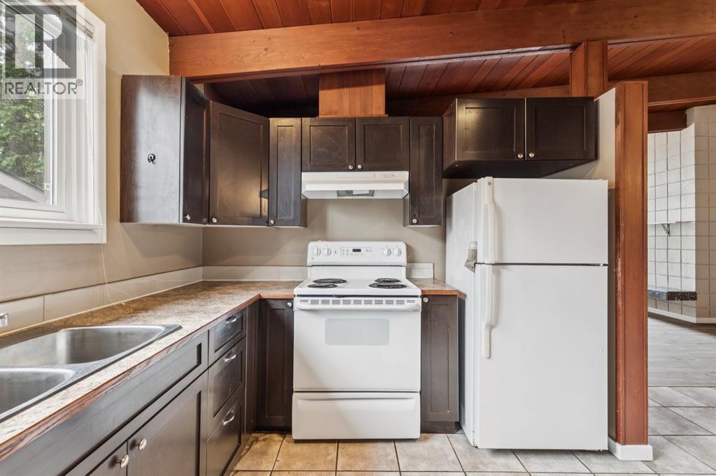 2144 Chilcotin Road NW, Calgary, Alberta  T2L 0X1 - Photo 18 - A2324146