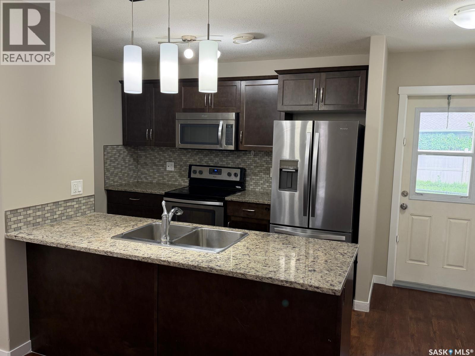 604 3440 Avonhurst Drive, Regina, Saskatchewan  S4R 2E1 - Photo 3 - SK045367