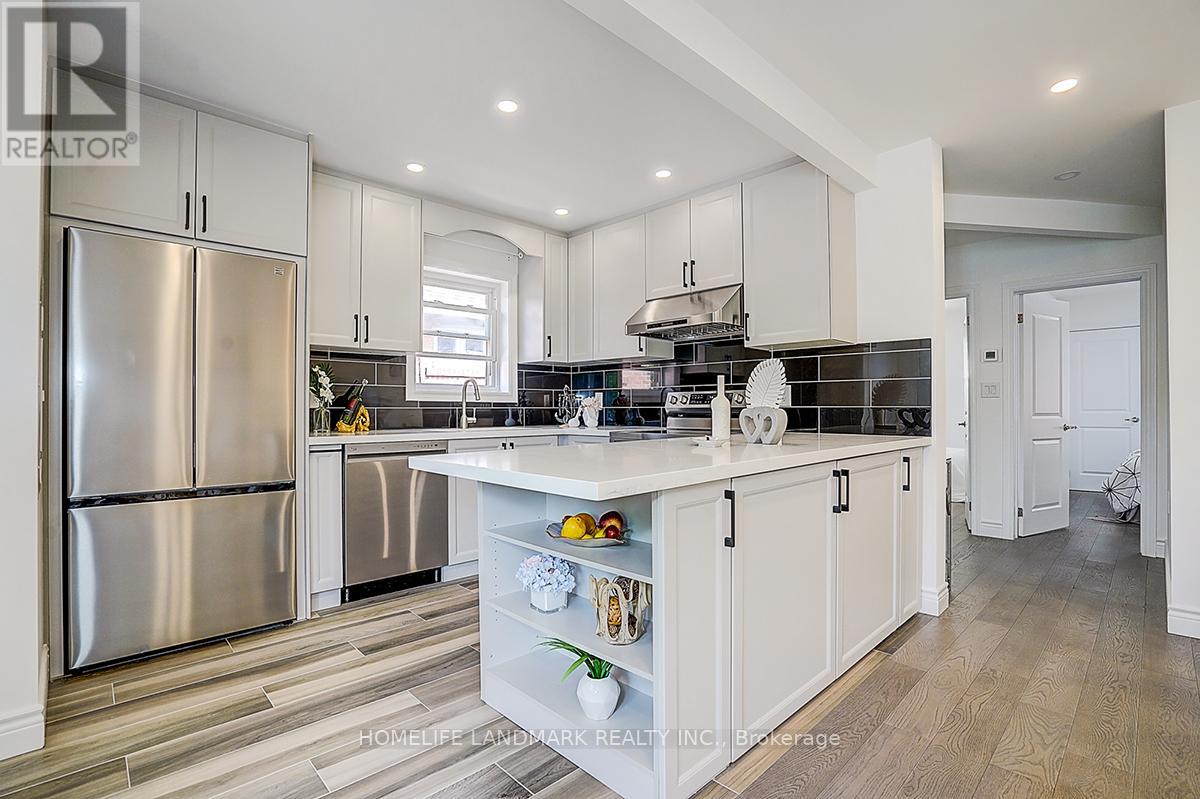 609 Mortimer Avenue, Toronto, Ontario  M4C 2J6 - Photo 11 - E13669590