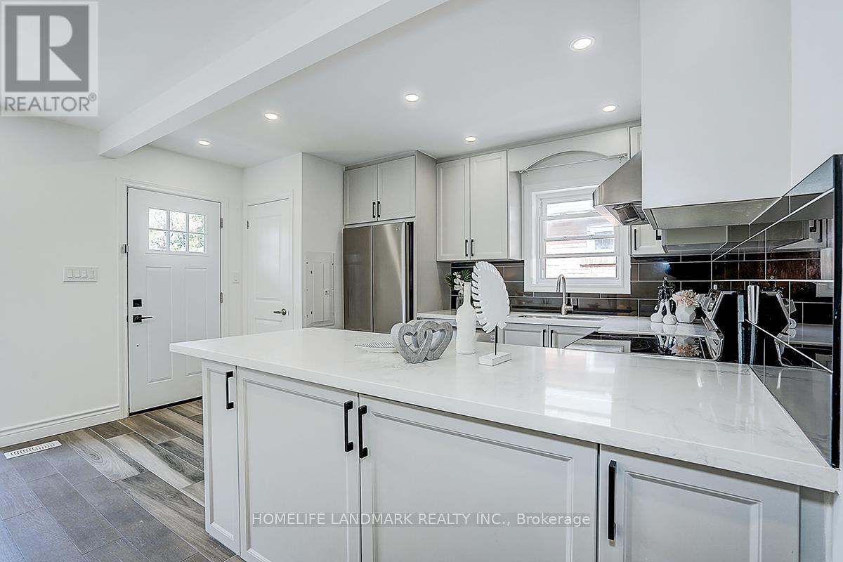 609 Mortimer Avenue, Toronto, Ontario  M4C 2J6 - Photo 15 - E13669590