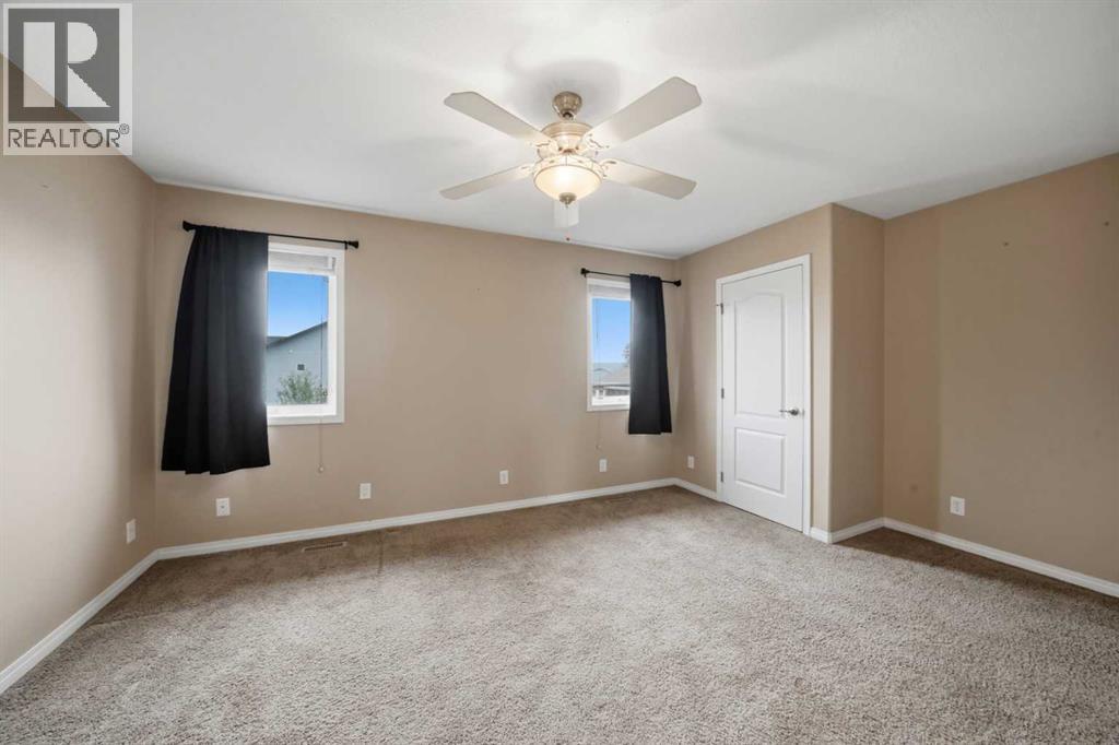 84 Heartland Crescent, Penhold, Alberta  T0M 1R0 - Photo 10 - A2336734