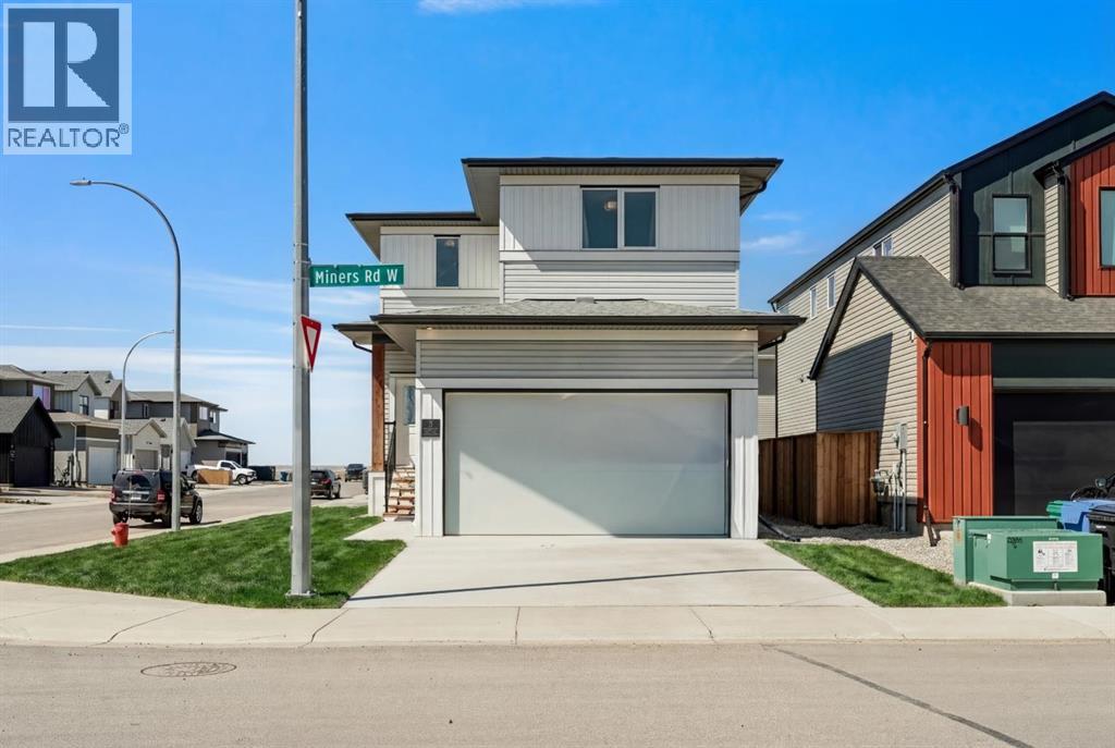<div class="slider-price">$689,900.00</div><p>2 Miners Road W, Lethbridge, Alberta</p>