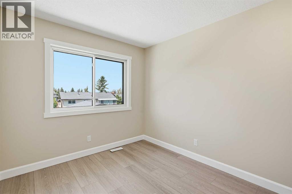 43 Beaconsfield Place Nw, Calgary, Alberta  T3K 1W8 - Photo 19 - A2326961