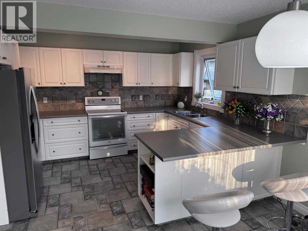 672 Killarney Glen Court SW, Calgary, Alberta T3E 7H4 - Photo 12 - A2333764
