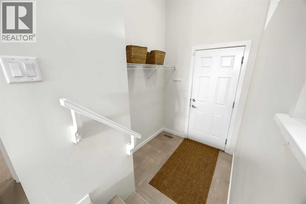 291 Paint Horse Drive, Cochrane, Alberta T4C 2M3 - Photo 4 - A2336105