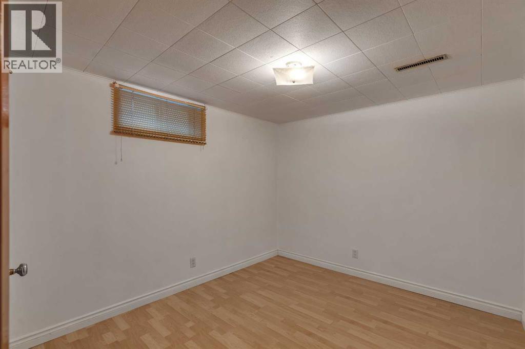 219 Tache Avenue NW, Calgary, Alberta  T2K 3R6 - Photo 25 - A2336935