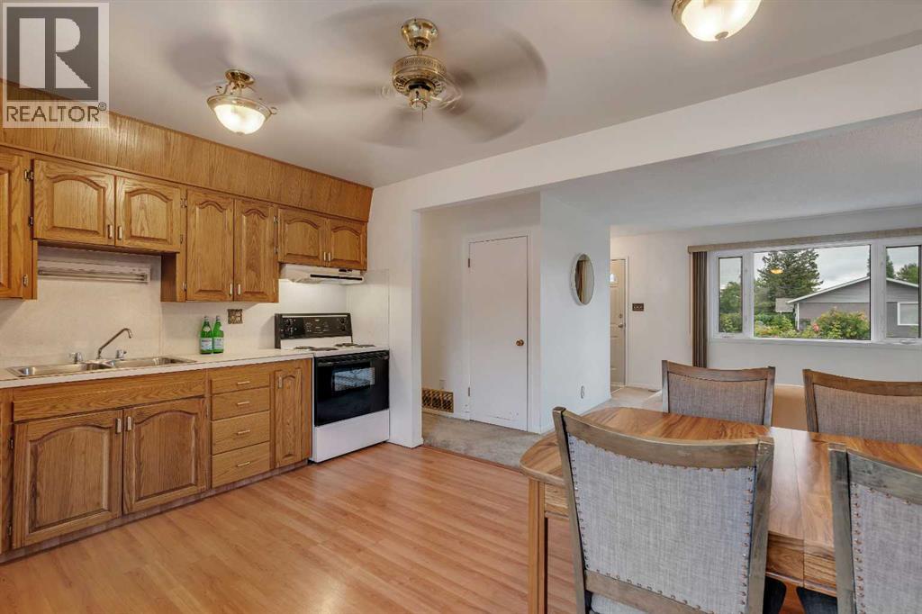 219 Tache Avenue NW, Calgary, Alberta  T2K 3R6 - Photo 7 - A2336935
